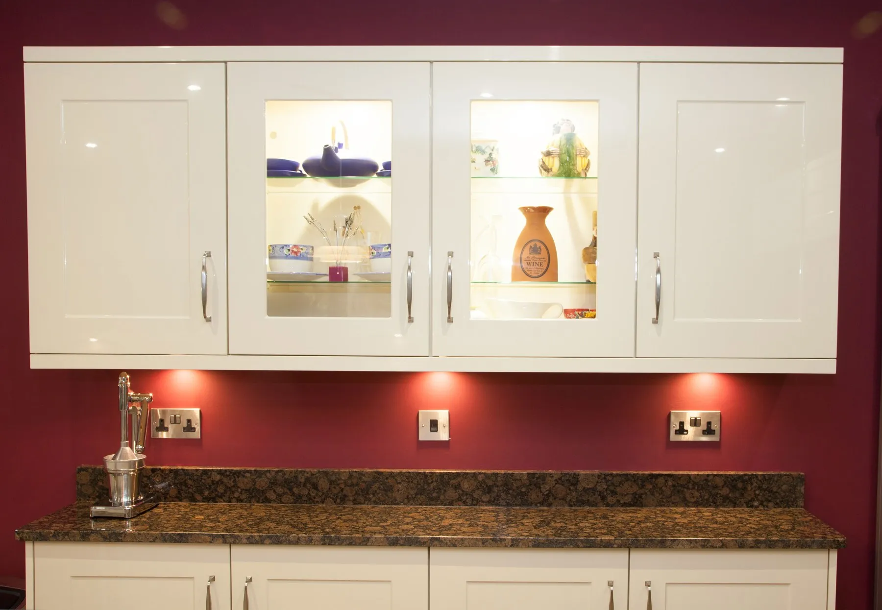 Glazed wall cabinets with lighting